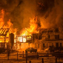 The bright flames in the darkness, pulled out of the four windows