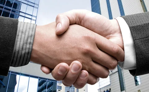 Two people shaking hands